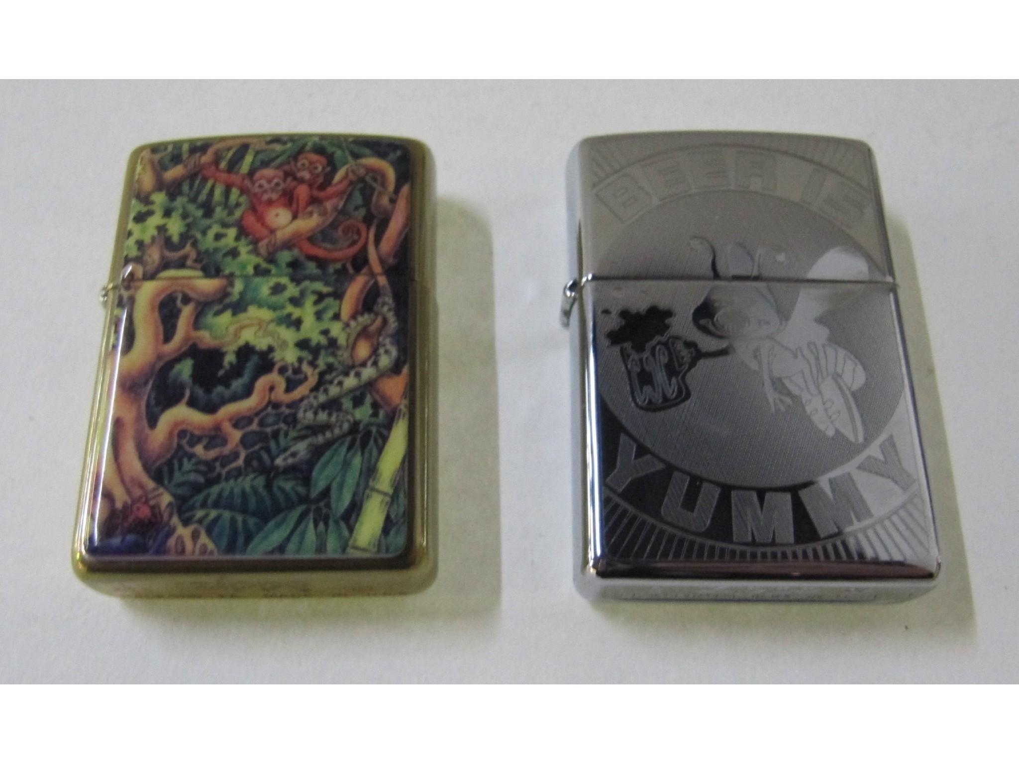 Appraisal: A lot comprising fifty five Zippo lighters