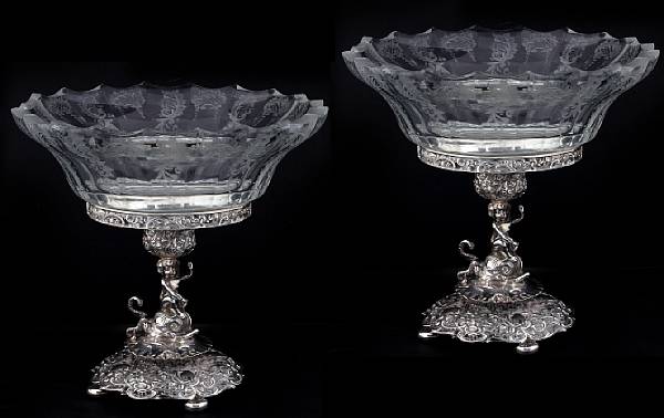 Appraisal: A German pair of standard silver figural compote stands with