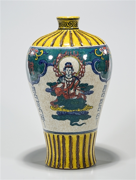 Appraisal: Chinese doucai and painted glazed porcelain vase depicting seated Guanyin