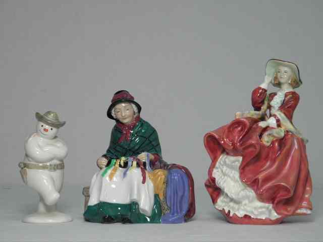 Appraisal: Lot of three Royal Doulton porcelain figurines Includes ''Silks and