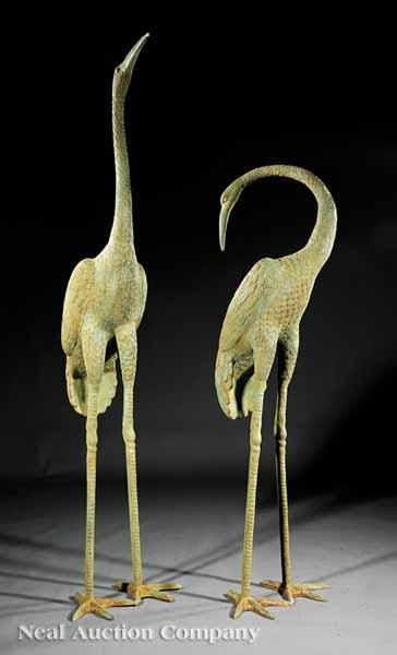 Appraisal: A Pair of Patinated Bronze Cranes fitted with fountain element