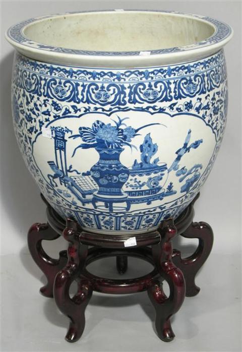 Appraisal: CHINESE STYLE BLUE AND WHITE GARDEN URN Mounted on wood