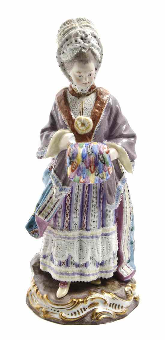 Appraisal: A Meissen Porcelain Lace Figure depicting a young lady in