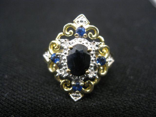 Appraisal: Sapphire Diamond Ring carat oval deep blue gem with four