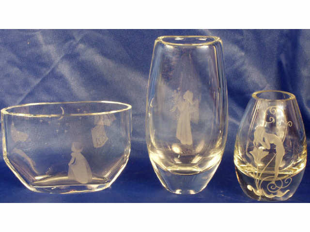 Appraisal: Collection of beautifully engraved design clear crystal vases with chip