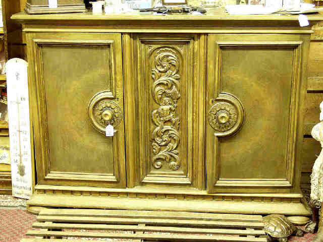 Appraisal: Large European oak two door cabinet with scroll carved center