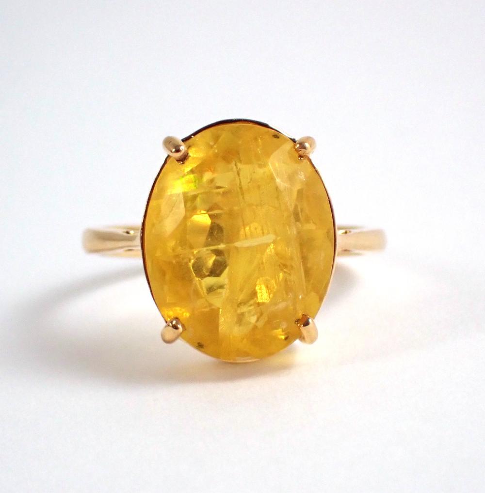 Appraisal: YELLOW FLUORITE AND FOURTEEN KARAT GOLD RING The k yellow