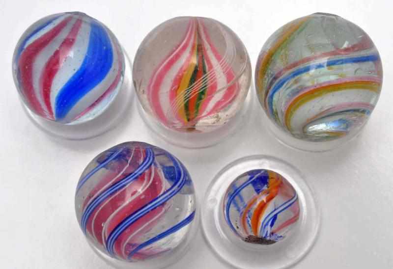 Appraisal: Lot of Single Ribbon Swirl Marbles Description Includes a pewee