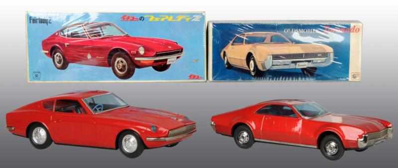 Appraisal: Lot of Tin Automobile Friction Toys Description Japanese Ichiko models