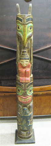 Appraisal: CARVED AND PAINTED WOOD TOTEM POLE featuring four carved totem