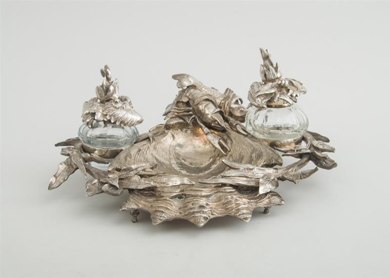 Appraisal: FRENCH SILVERED METAL ENCRIER The scallop-shell bowl with lobster and