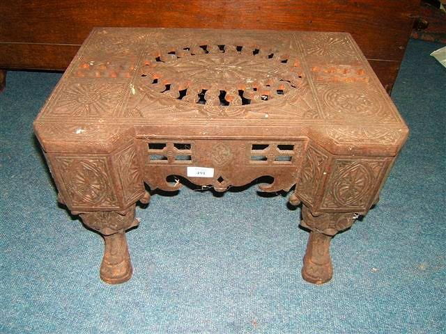 Appraisal: A th Century cast iron footman with pierced top and