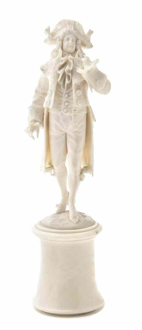 Appraisal: A Continental Carved Ivory Figure depicting a gentleman dressed in