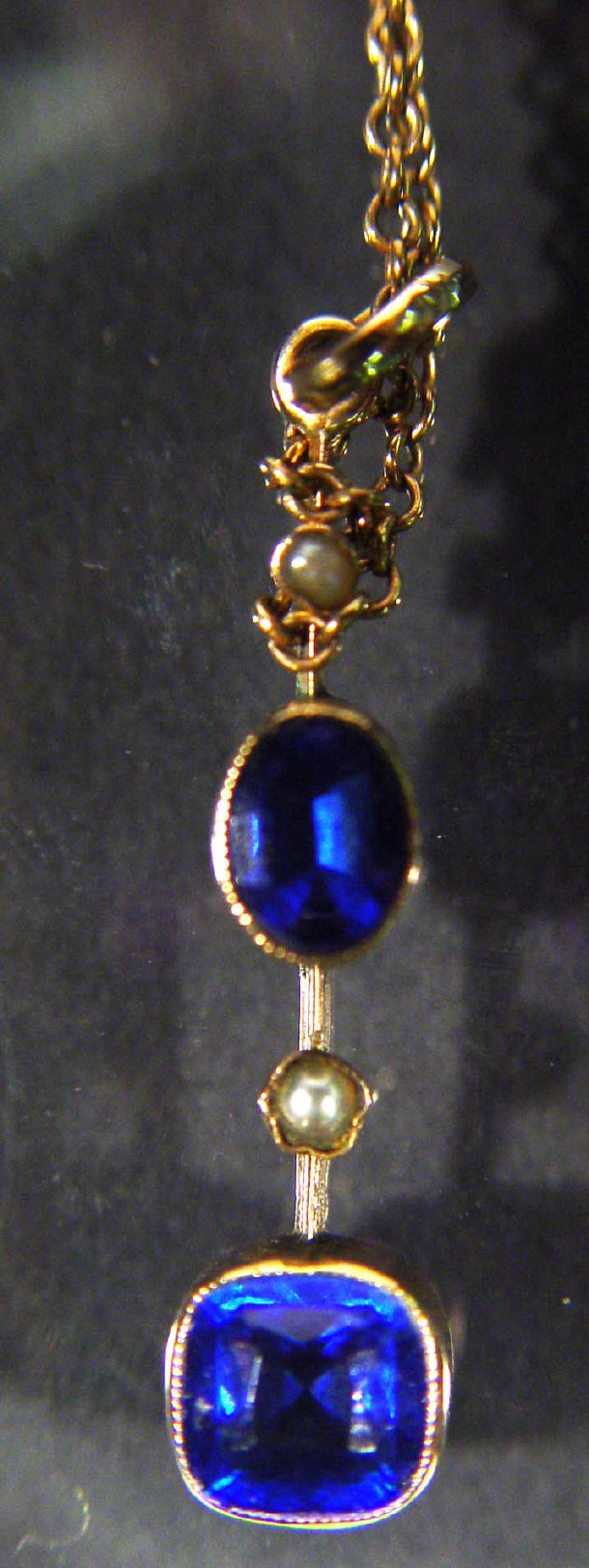 Appraisal: Edwardian ct gold pendant necklace with seed pearls and blue