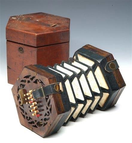 Appraisal: A Roylance Concertina with bone buttons on pierced rosewood ends