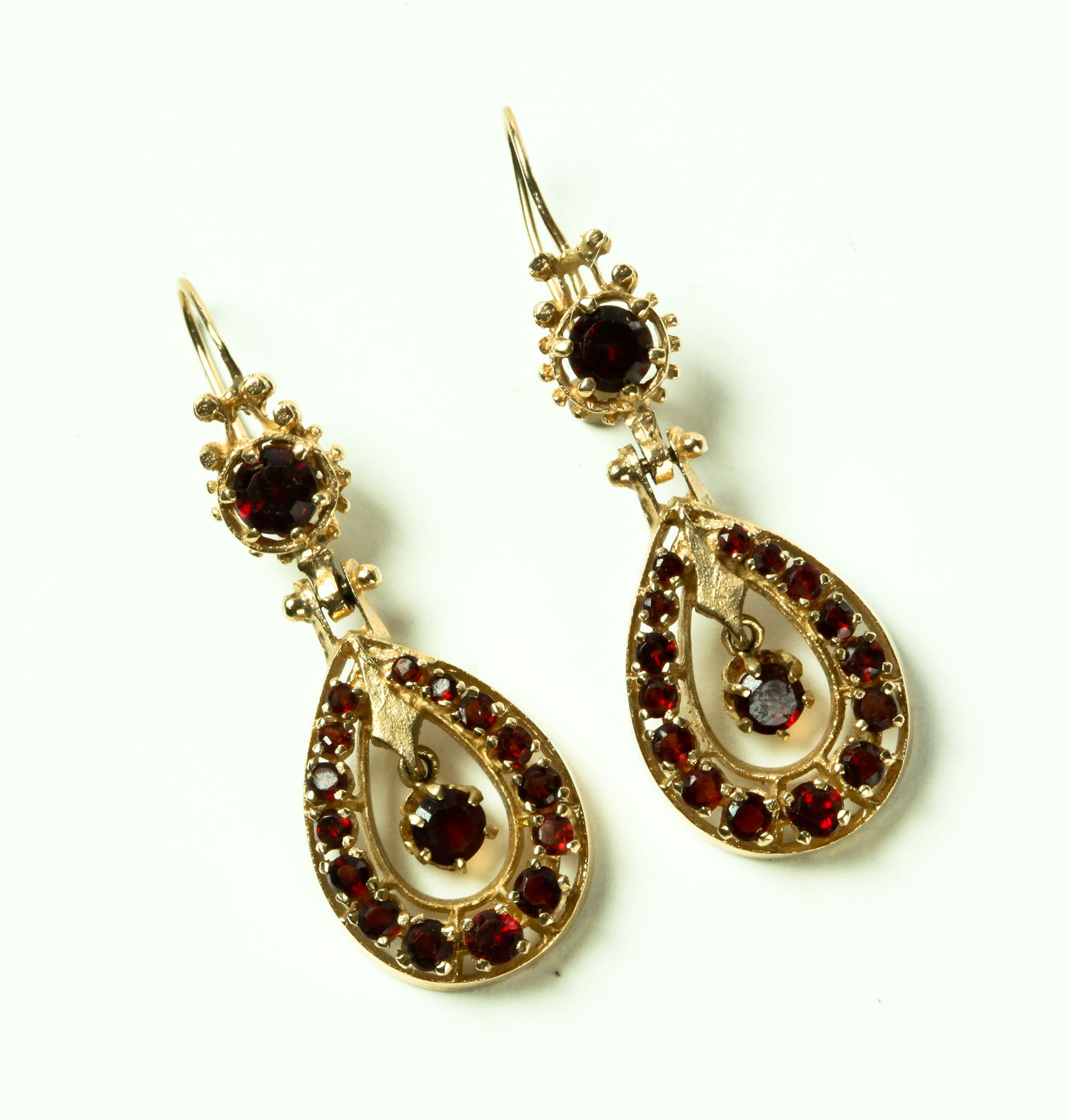 Appraisal: GARNET EARRINGS Twentieth century Victorian Revival K gold and garnet