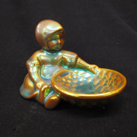 Appraisal: Zsolnay Pottery Figural Pin Dish seated girl with basket iridescent