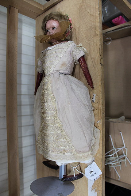 Appraisal: A VICTORIAN SLIT HEAD WAX OVER DOLL circa with brown