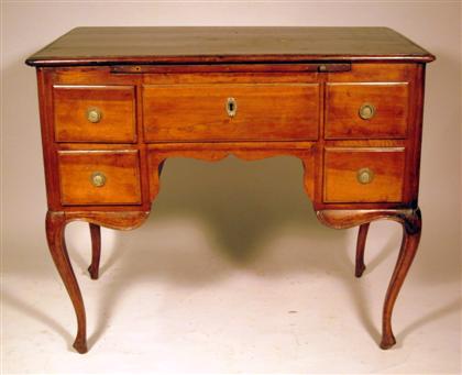 Appraisal: French Provincial walnut writing deskWith a rectangular top with molded