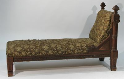 Appraisal: A carved oak day bed in the style of John