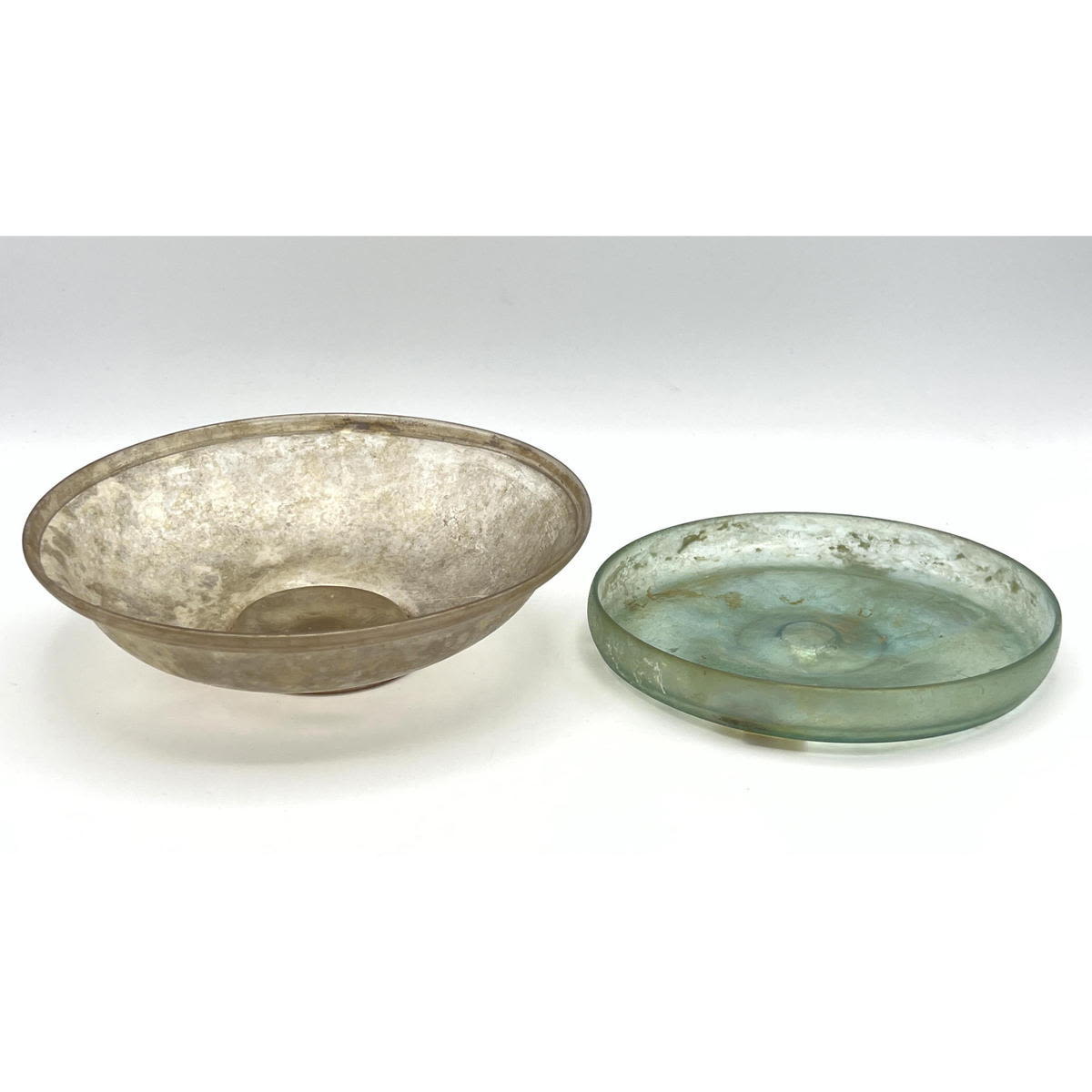 Appraisal: pc iridescent bowls Ancient Roman glass Green and goldish Dimensions