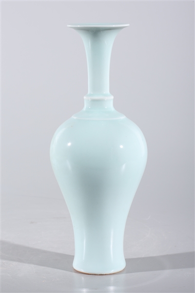 Appraisal: Chinese celadon glazed porcelain vase with double concentric rings to