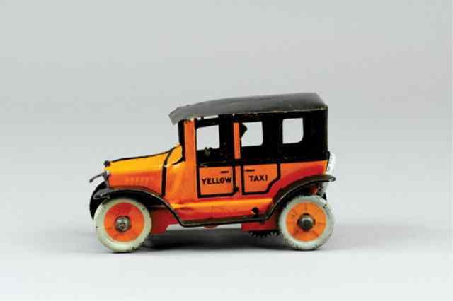 Appraisal: YELLOW TAXI Tinplate Taxi painted in orange and black white