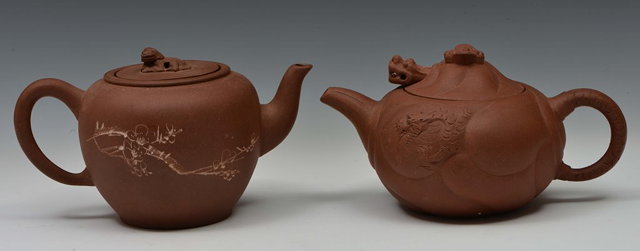 Appraisal: A CHINESE YIXING TEAPOT with dragon head handle and one