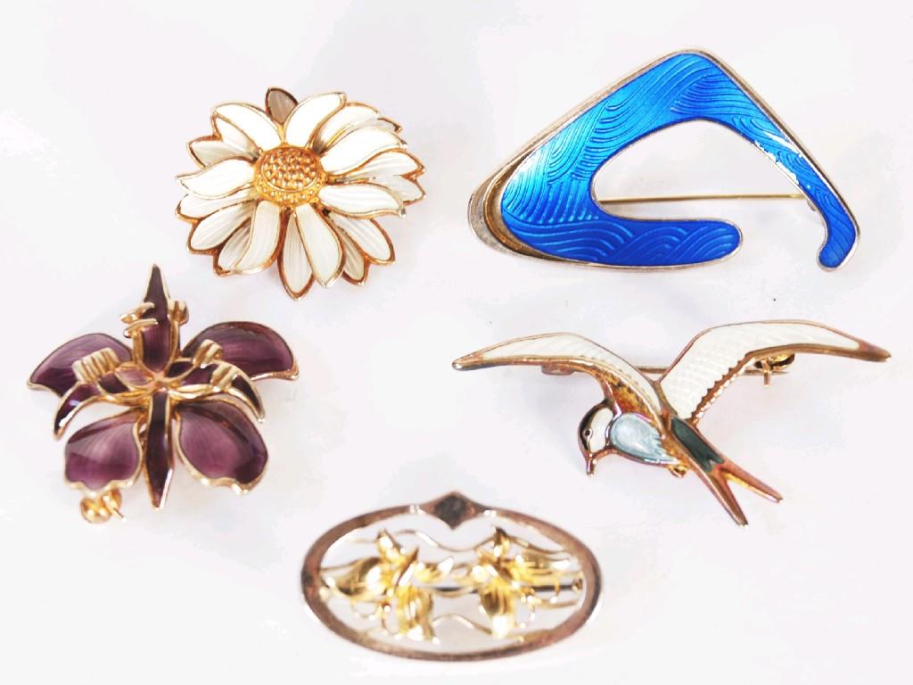 Appraisal: FOUR DAVID ANDERSEN Norway SILVER AND ENAMEL BROOCHES one of