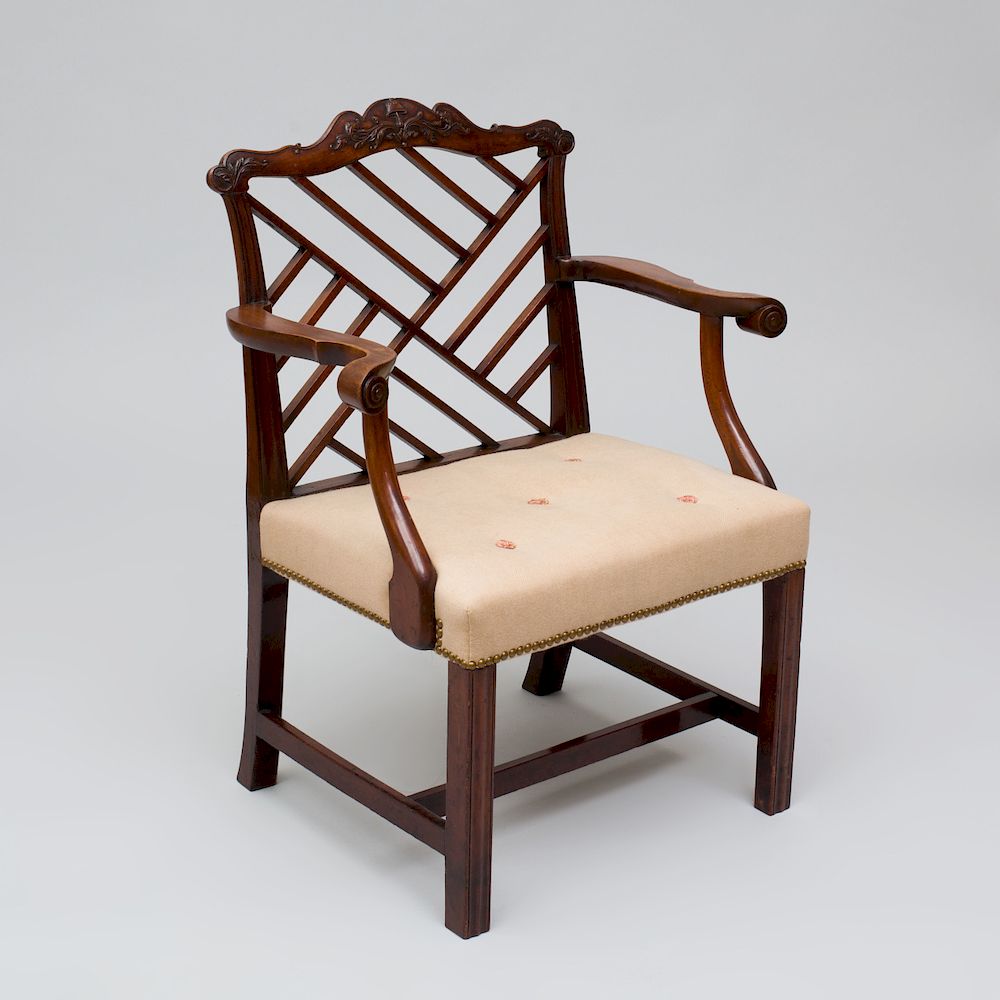 Appraisal: George III Carved Mahogany Armchair Fitted with an upholstered seat