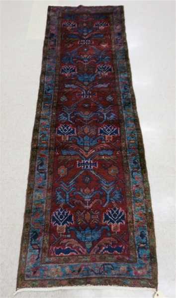 Appraisal: SEMI-ANTIQUE PERSIAN RUNNER Hamadan tribal region northwest Iran stylized floral