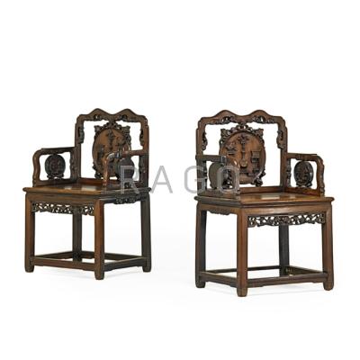 Appraisal: PAIR OF CHINESE ARM CHAIRS Teak with carved panels ca