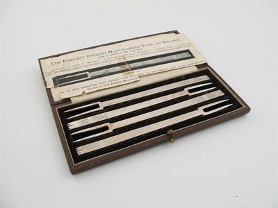 Appraisal: A modern cased set of four Britannia standard and notched