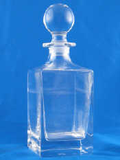 Appraisal: A square spirit decanter in clear glass the base marked