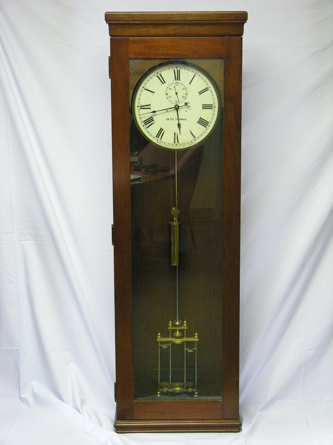 Appraisal: TALL SETH THOMAS MERCURY WEIGHT CLOCK h x w X