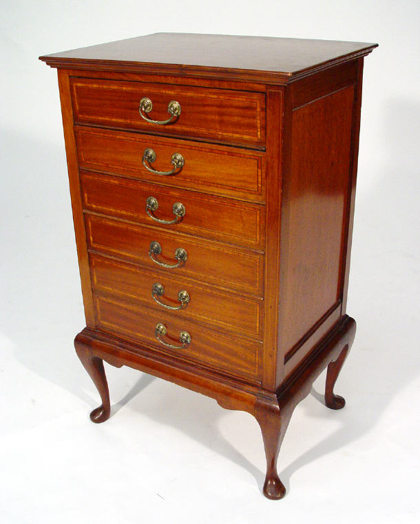 Appraisal: Edwardian inlaid mahogany music cabinet fitted six drawers on cabriole