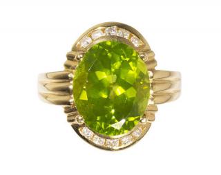 Appraisal: Peridot diamond and k yellow gold ring Peridot diamond and