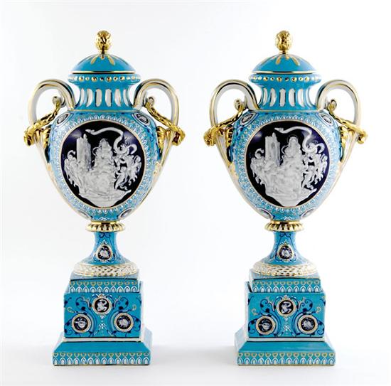 Appraisal: Pair Minton style porcelain covered urns on pedestals lid with