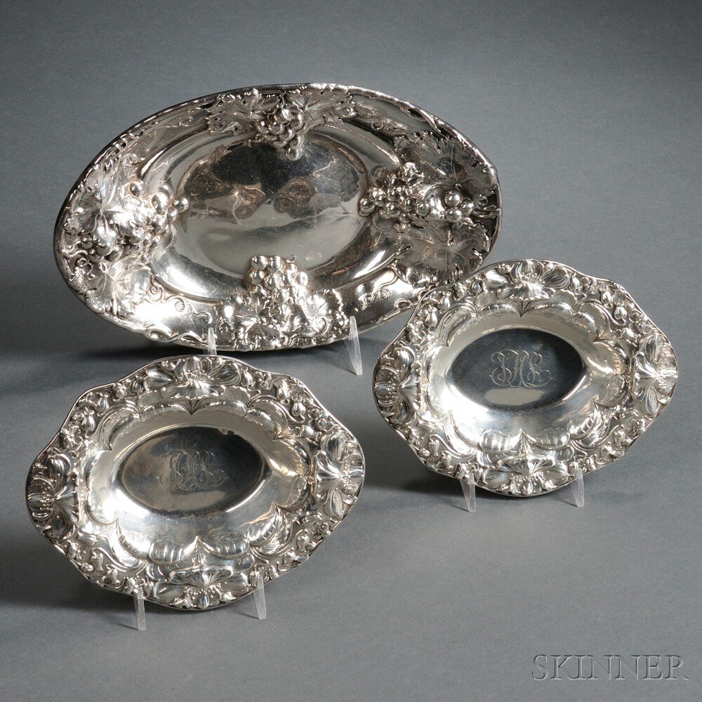 Appraisal: Three American Oval Repousse-decorated Sterling Silver Dishes two Gorham the