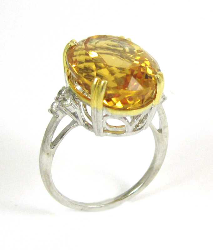 Appraisal: CITRINE DIAMOND AND FOURTEEN KARAT GOLD RING The white and