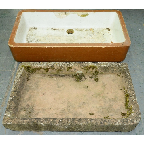 Appraisal: A shallow sandstone rectangular sink with rounded front right corner