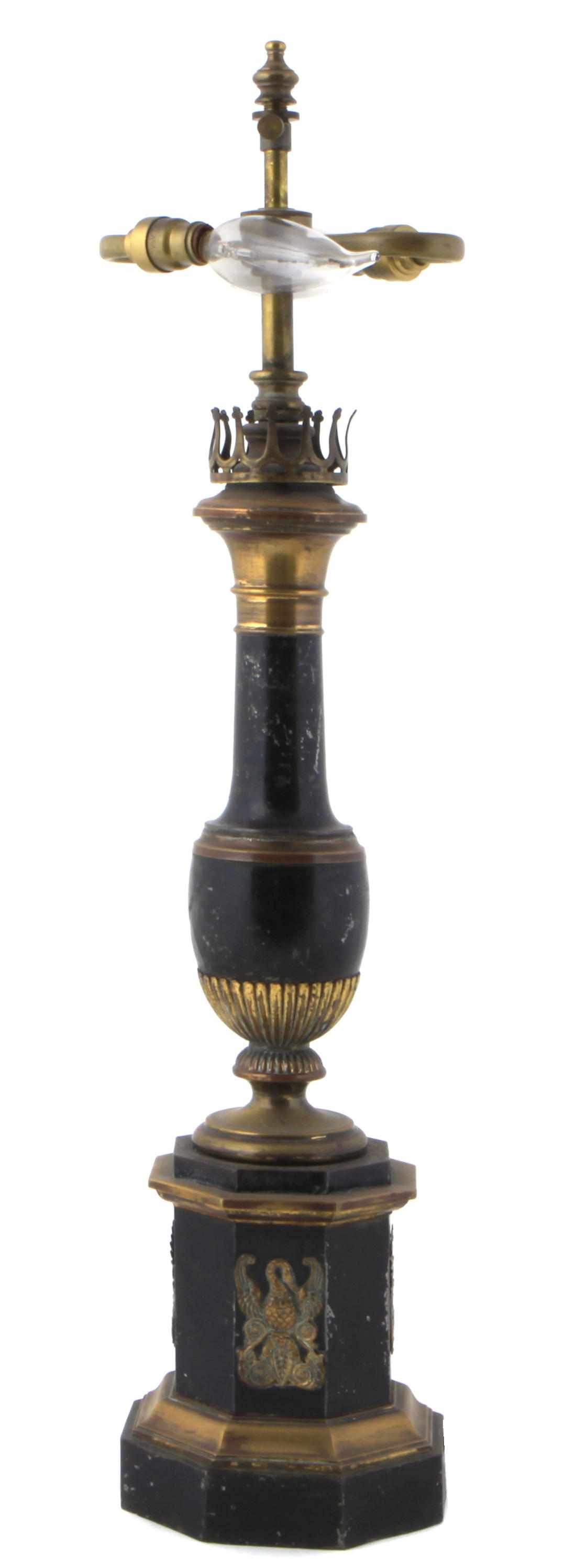 Appraisal: A Continental gilt metal mounted ebonized table lamp height excluding