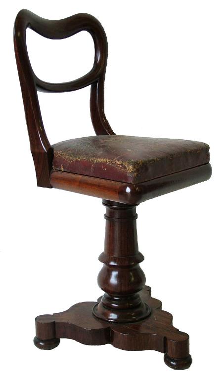 Appraisal: th century rosewood revolving music chair the balloon back and