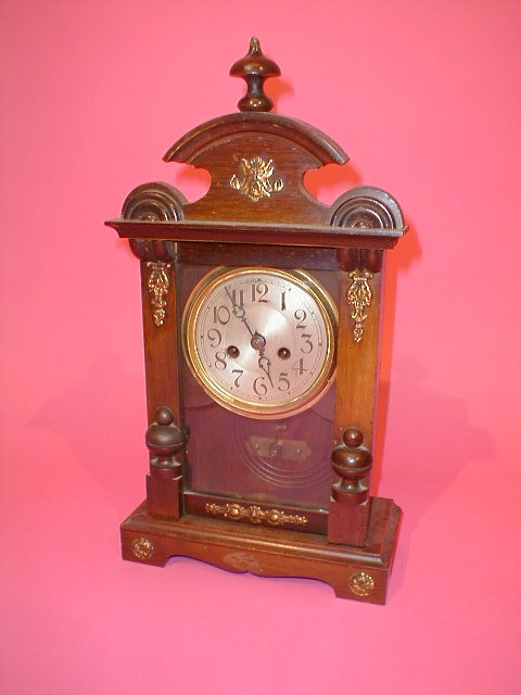 Appraisal: An American walnut cased shelf clock high