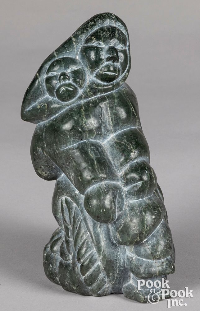 Appraisal: Inuit carved stone woman and child Inuit carved stone woman