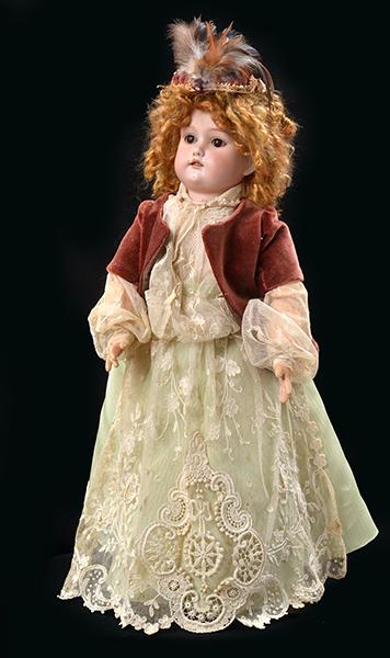 Appraisal: A BISQUE HEAD GERMAN GIRL DOLL on a composite body