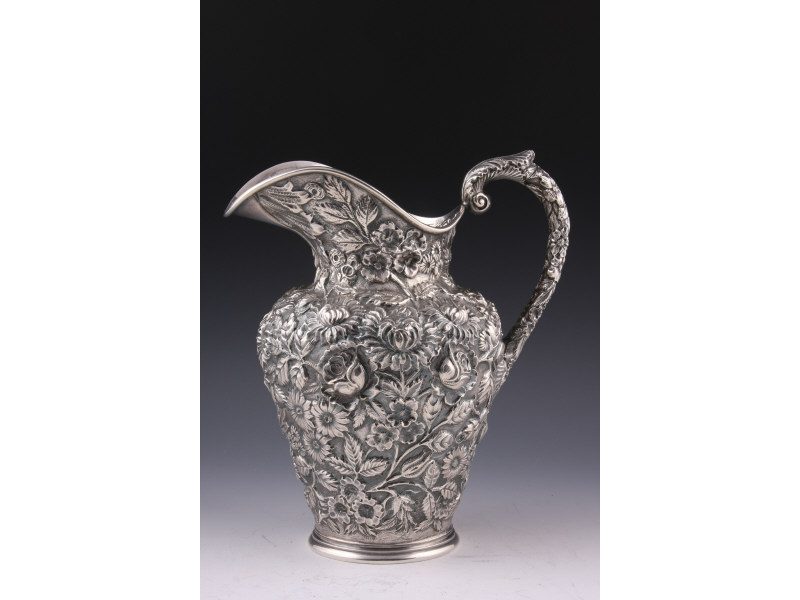 Appraisal: Baltimore Silversmith's Sterling Repousse Pitcher ca all over floral repousse