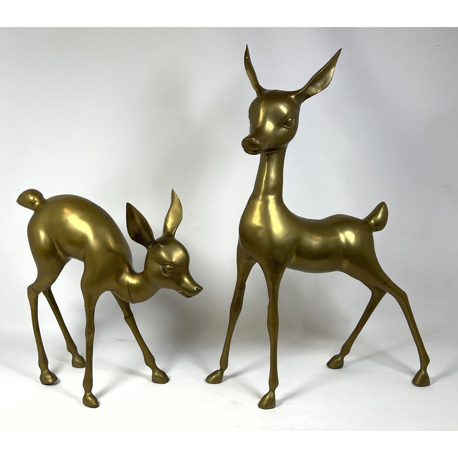 Appraisal: pc Brass Figural Deer Sculptures Holiday seasonal decor Dimensions H