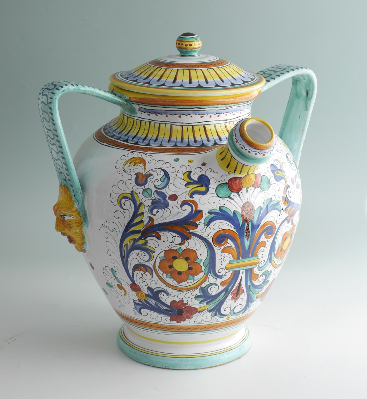 Appraisal: ITALIAN DERUTA POTTERY WATER JUG Vibrant hand-painted decoration double-handled jug