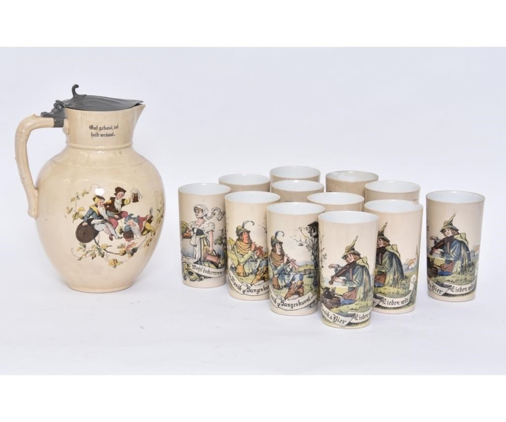 Appraisal: A Geschutzt German beer pitcher marked together with porcelain Mettlach